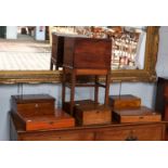 A mahogany box on stand, fitted with a drawer and lidded compartments, 32cm by 25cm by 65cm,