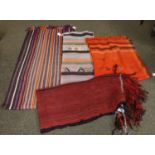 Omani flat weave blanket, the field comprised of narrow charcoal and terracotta columns, enclosed by