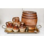 Four 19th century sprigged salt glazed stoneware jugs and a barrel, together with a silver plated