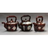 Three Victorian Bargeware teapots and covers, and a pair of similar modern examples