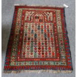 Karabagh prayer rug, the ivory field beneath the Mirab enclosed by mint green borders, 99cm by 61cm