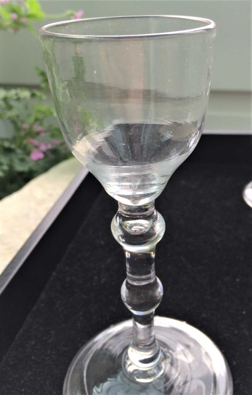 A Balustroid Wine Glass, circa 1740, the ogee bowl on a double ball-knopped plain stem and folded - Image 5 of 7