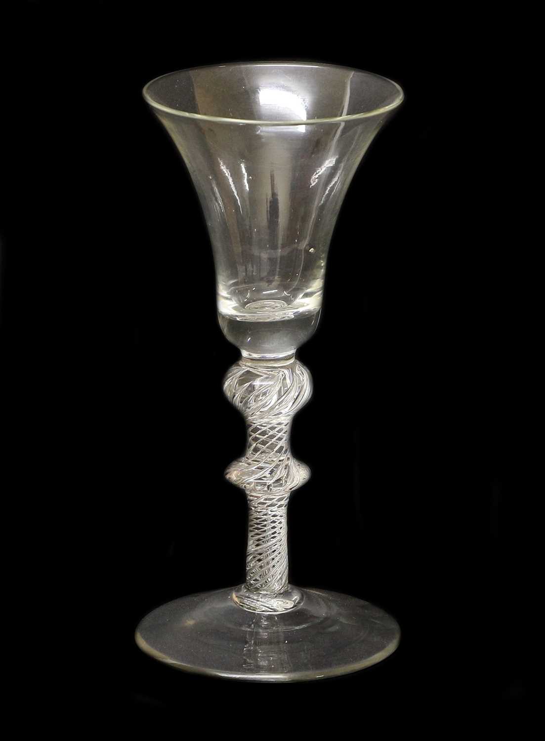 A Large Wine Glass, circa 1745, the bell-shaped bowl on an air twist stem with shoulder ball knop