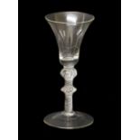 A Large Wine Glass, circa 1745, the bell-shaped bowl on an air twist stem with shoulder ball knop