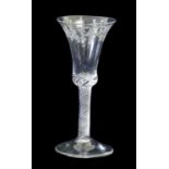 A Wine Glass, circa 1750, the bell shaped bowl engraved with a band of foliage on an air twist