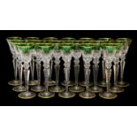 A Set of Eighteen St Louis Green-Flashed and Gilt Wine Glasses, 20th century, the fluted funnel