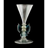 A Façon de Venise Winged Wine Glass, probably Netherlands, 17th century, the funnel bowl with