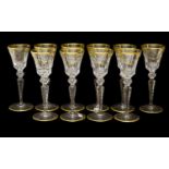 A Set of Ten Slightly Smaller Red Wine Glasses, en suite25cm highOne with a long flat chip to the