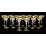 A Set of Fifteen Champagne Saucers, en suite19cm highOne glass with very shallow long chip to the