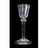 A Balustroid Wine Glass, circa 1740, the bell shaped bowl on a flattened knop and inverted