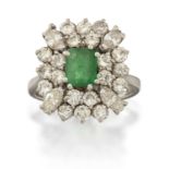 An 18 Carat White Gold Emerald and Diamond Cluster Ring