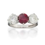 An 18 Carat White Gold Ruby and Diamond Three Stone Ring