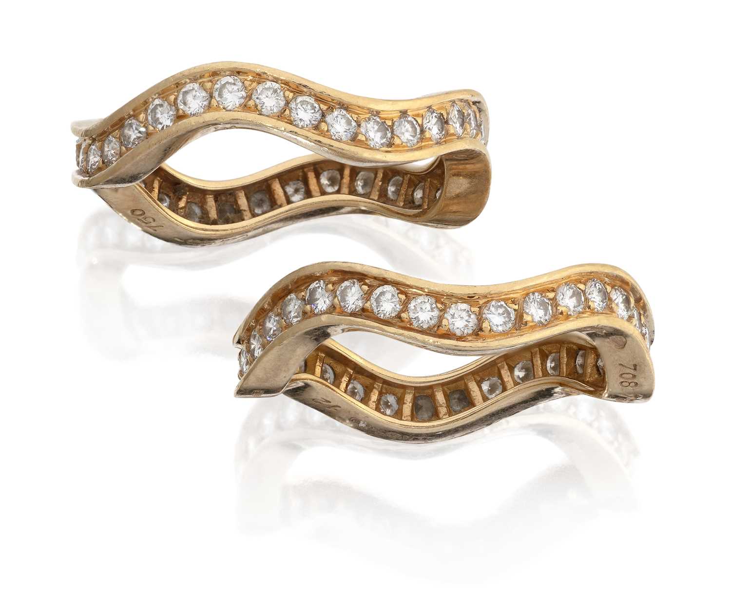Two 18 Carat Gold Diamond Eternity Rings by Cartier