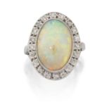 A 14 Carat White Gold Opal and Diamond Cluster Ring