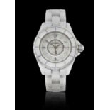 Chanel: A Lady's White Ceramic Centre Seconds Wristwatch signed Chanel, model: J12, ref: WM55949, ci