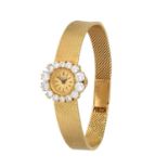Patek Philippe: A Lady's 18 Carat Gold Diamond Set Wristwatch signed Patek Philippe, Geneve, ref: 33