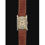 LeCoultre: A Lady's Art Deco 18 Carat Two Colour Gold Square Shaped Wristwatch signed LeCoultre, cir