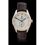 Tag Heuer: A Steel and Gold Automatic Calendar Wristwatch signed Tag Heuer, model: Carrera, ref: WAS