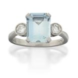 An Aquamarine and Diamond Three Stone Ring