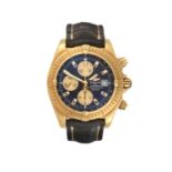 Breitling: An 18 Carat Gold Automatic Calendar Chronograph Wristwatch signed Breitling, Chronographe