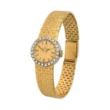 Omega: A Lady's 18 Carat Gold Diamond Set Wristwatch signed Omega, 1970