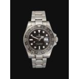 Rolex: A Stainless Steel Automatic Calendar Centre Seconds Dual Time Zone Wristwatch signed Rolex, O