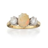 An 18 Carat Gold Opal and Diamond Three Stone Ring