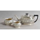 A Three-Piece Victorian and Edward VII Silver Tea-Service, by William Henry Leather, Birmingham, The