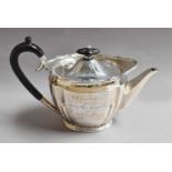 An Edward VII Silver Teapot, by Roberts and Belk Ltd., Sheffield, 1905, fluted oval and with