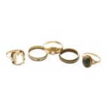 A 9 carat gold citrine ring, finger size M1/2; a 9 carat gold hardstone ring, finger size N; a 9