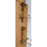 A pair of gilt painted twin light wall sconces, 60cm