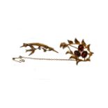 A 9 carat gold garnet brooch, length 4.2cm; and a 9 carat gold seed pearl brooch, length 4.5cm (a.