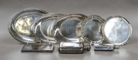 A Collection of Silver Plate, including: a hot-water jug; two differing mugs; assorted napkin-rings;