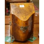 A reproduction burr walnut serperntine fronted box with gilt metal mounts