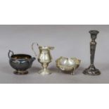 Four Silver Items, comprising: a cream-jug in the George III style; a pierced dish on four scroll