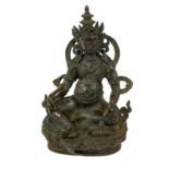 A Sino-Tibetan bronze figure of Vaisravana, Qing Dynasty, probably 18th century, seated wearing