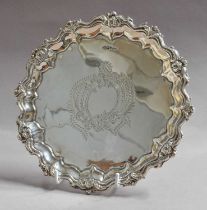 An Edward VII Silver Salver, by Walker and Hall, Sheffield, 1901, shaped circular and on three
