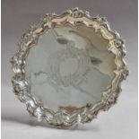 An Edward VII Silver Salver, by Walker and Hall, Sheffield, 1901, shaped circular and on three