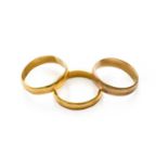 Two 22 carat gold band rings, finger sizes O and P; and a 9 carat gold band ring, finger size MTwo