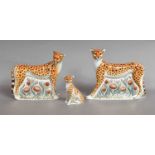 A Royal Crown Derby Cheetah Family Group of paperweights, 'Cheetah Daddy', gold stopper, boxed, '