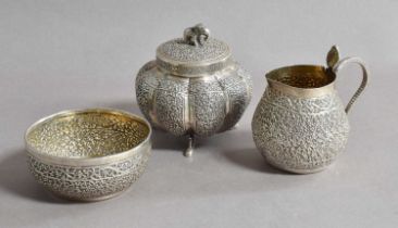 Three Various Indian Silver Items, including: a canister with pull-off cover, with elephant cast