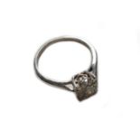 A 9 carat gold diamond cluster ring, finger size LGross weight 2.3 grams.