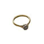 A diamond solitaire ring, stamped '18CT&PLAT', finger size JGross weight 2.2 grams.