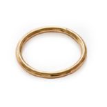 A 9 carat gold bangle, inner measurement 5.6cm diameterGross weight 11.1 grams.