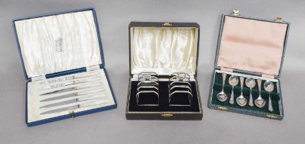 A Collection of Cased Sets of Silver Flatware, including: three cased sets of six tea or coffee-