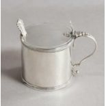 A George III Silver Mustard-Pot, by Charles Aldridge, London, 1793, drum-shaped and with scroll