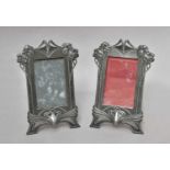 A pair of WMF pewter Art Nouveau photograph frames on strut stands, 16cm (2)No breaks or repairs,