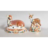 Two Royal Crown Derby paperweights, 'Roe Deer', gold stopper, and 'Fawn', both designed