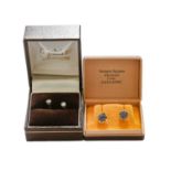 A pair of 18 carat white gold diamond solitaire earrings, with post fittings; and a pair of