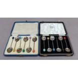 A Collection of Assorted Cased Sets of Spoons, comprising: two sets of six coffee-spoons, each